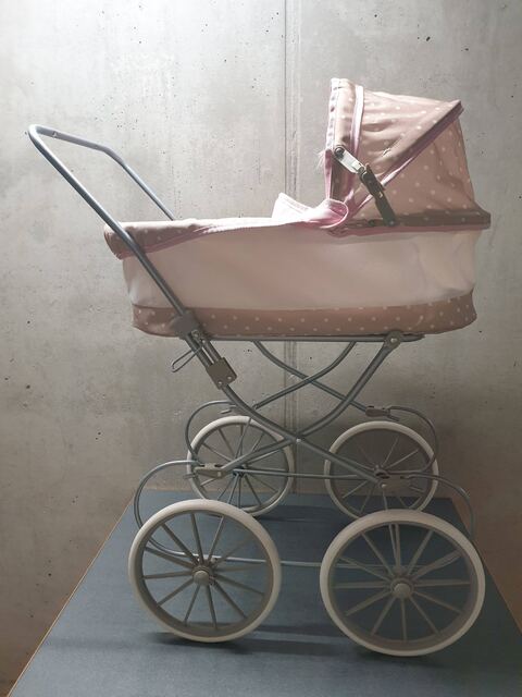 Poussette brune-rose
